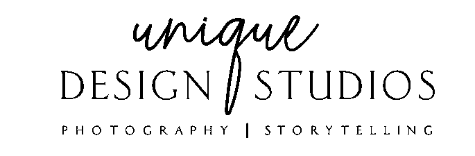 A black and white image of the logo for unique design studio.